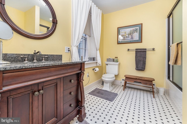 bathroom with a baseboard radiator, toilet, baseboards, tile patterned floors, and vanity