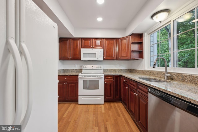 2327 London Bridge Dr, Silver Spring, MD 20906 - kitchen featuring white appliances, a sink, light stone countertops, recessed lighting, and light wood-type flooring