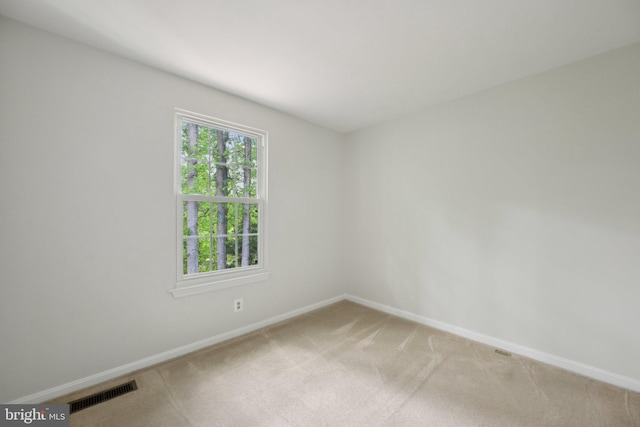 2327 London Bridge Dr, Silver Spring, MD 20906 - spare room featuring baseboards and light colored carpet