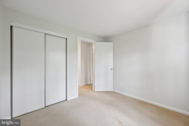 2327 London Bridge Dr, Silver Spring, MD 20906 - unfurnished bedroom with carpet, baseboards, and a closet