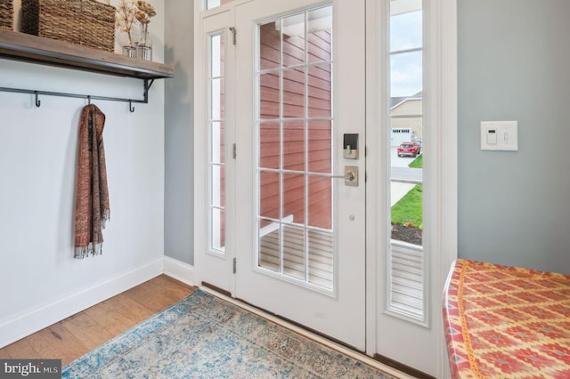 23336 Horse Island Rd, Lewes, DE 19958 - entryway with baseboards and wood finished floors