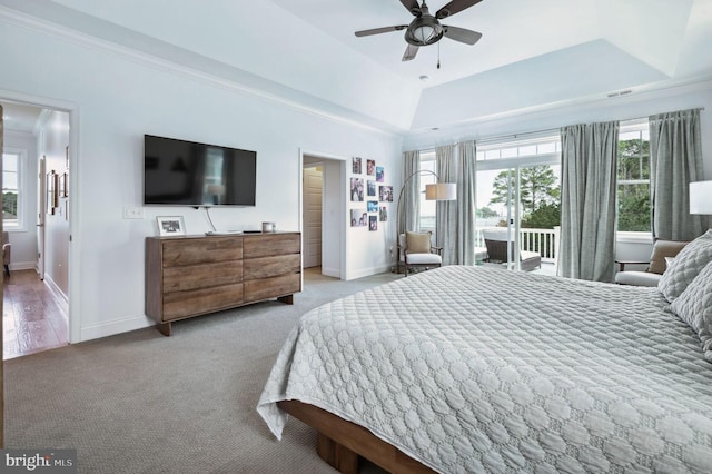 23336 Horse Island Rd, Lewes, DE 19958 - carpeted bedroom featuring baseboards, access to exterior, a ceiling fan, and multiple windows