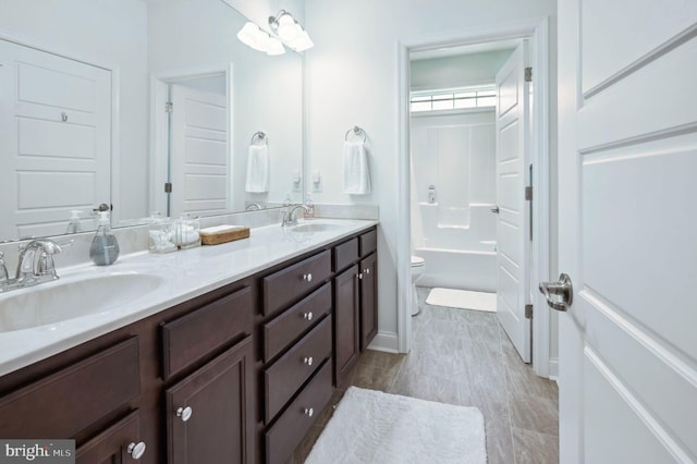 23336 Horse Island Rd, Lewes, DE 19958 - bathroom featuring toilet, double vanity, and a sink