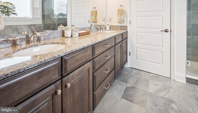 23336 Horse Island Rd, Lewes, DE 19958 - bathroom featuring double vanity, a shower stall, and a sink