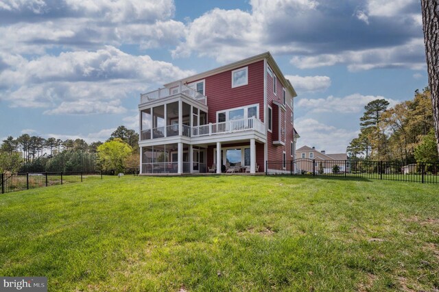 23336 Horse Island Rd, Lewes, DE 19958 - back of house with a sunroom, a lawn, a fenced backyard, and a balcony