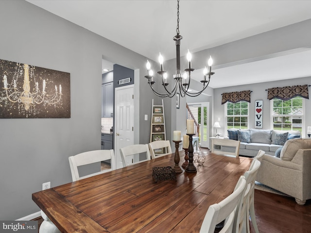 33759 Bay Ridge Ln, Lewes, DE 19958 - dining room with a chandelier and dark wood finished floors