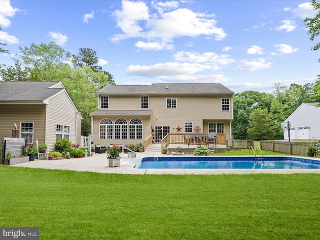 33759 Bay Ridge Ln, Lewes, DE 19958 - rear view of property with a wooden deck and a patio area