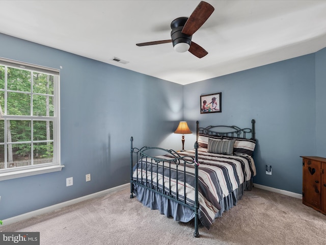 33759 Bay Ridge Ln, Lewes, DE 19958 - bedroom featuring carpet, baseboards, and ceiling fan