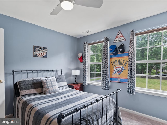 33759 Bay Ridge Ln, Lewes, DE 19958 - carpeted bedroom with baseboards and a ceiling fan