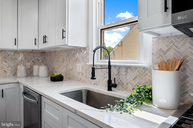 1233 Kendrick Rd, Rosedale, MD 21237 - kitchen featuring a sink, dishwasher, tasteful backsplash, and white cabinets