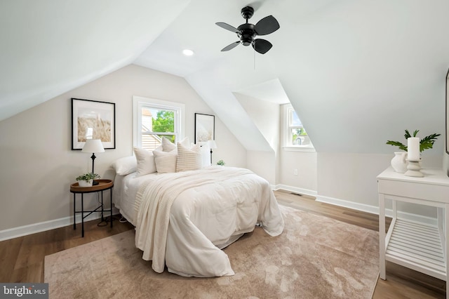 1233 Kendrick Rd, Rosedale, MD 21237 - bedroom featuring wood finished floors, vaulted ceiling, baseboards, and a ceiling fan