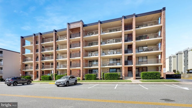 6 141st St Unit 304, Ocean City, MD 21842 - view of apartment building / complex featuring uncovered parking