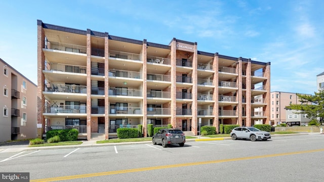 6 141st St Unit 304, Ocean City, MD 21842 - view of apartment building / complex featuring uncovered parking