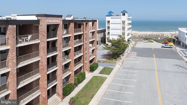 6 141st St Unit 304, Ocean City, MD 21842 - view of property featuring uncovered parking and a water view