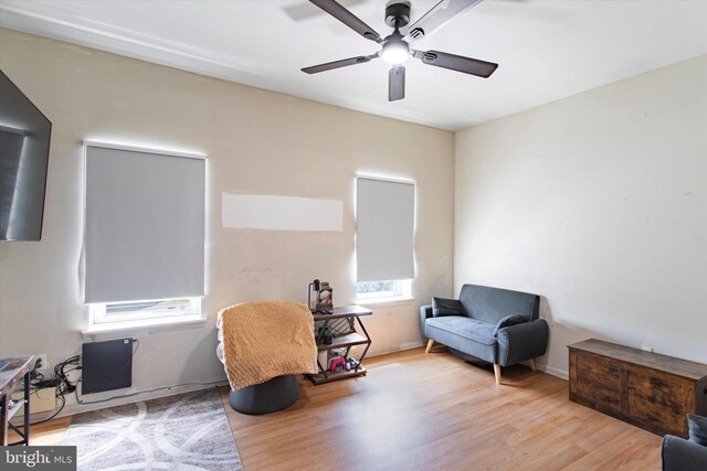 2059 W Oxford St, Philadelphia, PA 19121 - living area featuring wood finished floors and a ceiling fan