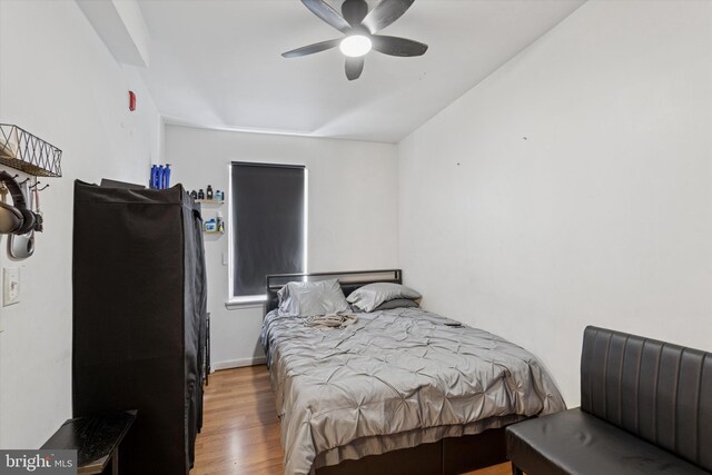 2059 W Oxford St, Philadelphia, PA 19121 - bedroom with wood finished floors and ceiling fan