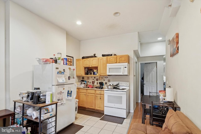 2059 W Oxford St, Philadelphia, PA 19121 - kitchen with white appliances, light brown cabinets, light tile patterned floors, recessed lighting, and light countertops