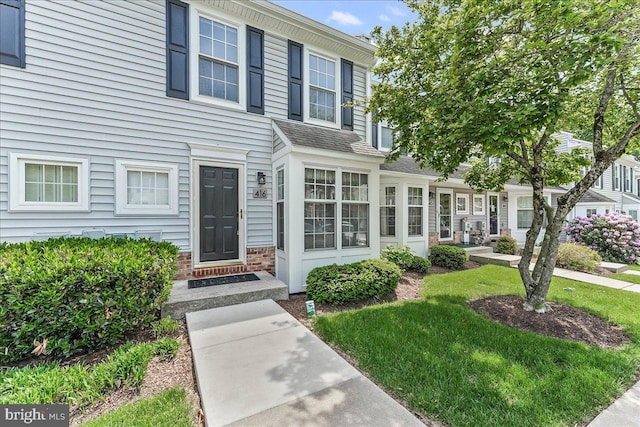 416 Hartford Sq Unit 41, West Chester, PA 19380 - view of front facade with a front yard