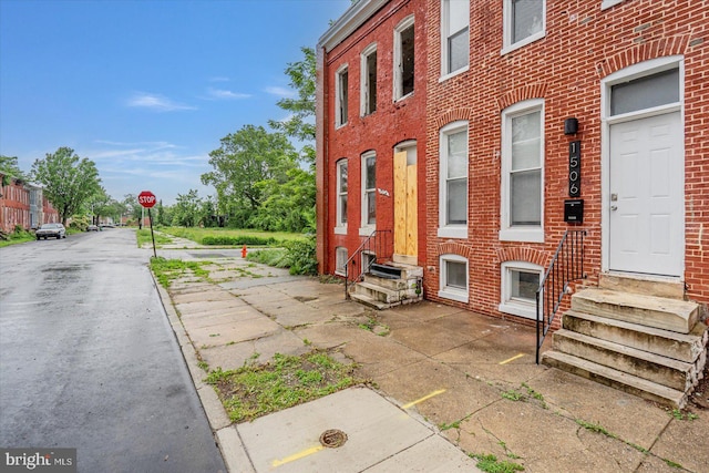 view of building exterior with entry steps