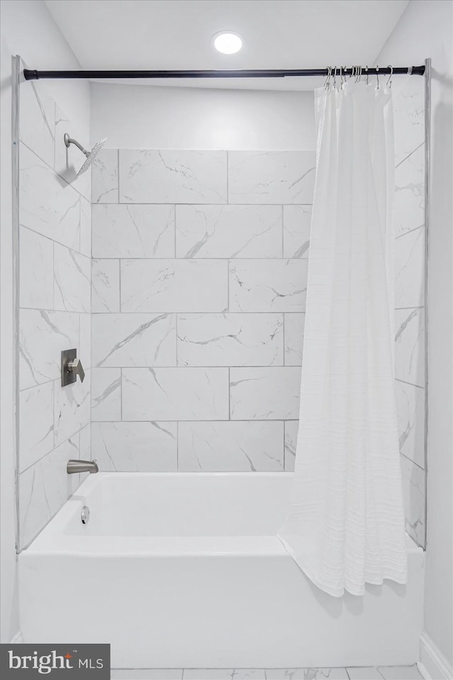 full bath featuring shower / bath combo and recessed lighting