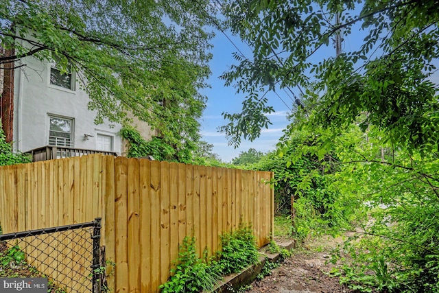 view of yard with fence