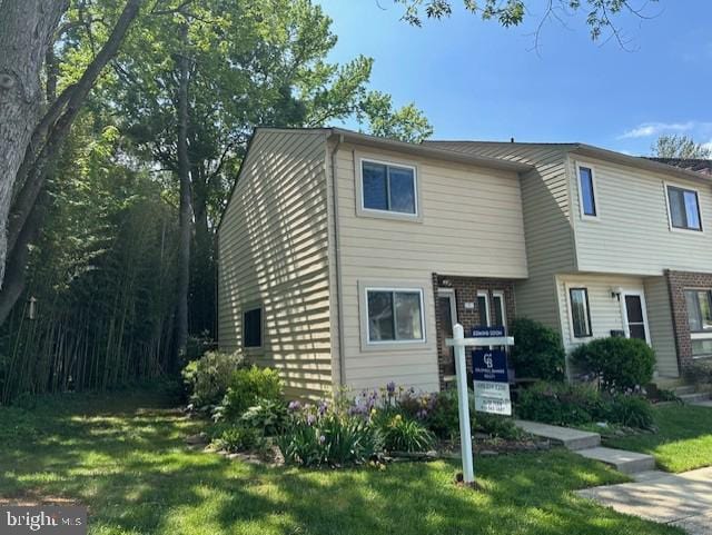 1211 Hesselius Ct, Annapolis, MD 21403 - view of property with a front lawn