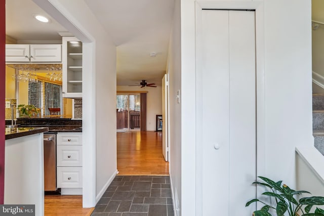 1211 Hesselius Ct, Annapolis, MD 21403 - corridor featuring dark stone finish floors, baseboards, and recessed lighting