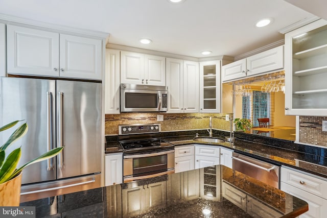 1211 Hesselius Ct, Annapolis, MD 21403 - kitchen featuring stainless steel appliances, a sink, white cabinets, glass insert cabinets, and backsplash