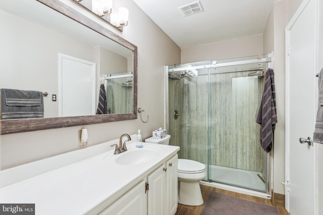 1211 Hesselius Ct, Annapolis, MD 21403 - full bath with vanity, toilet, a stall shower, and wood finished floors