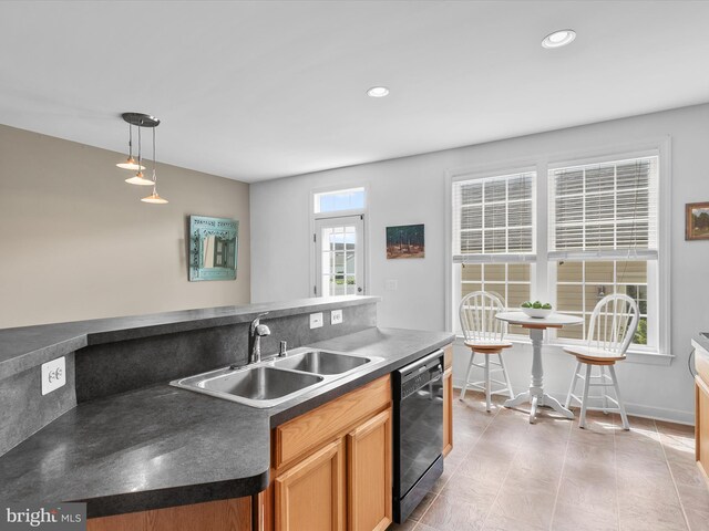 206 Village Center Blvd, Milton, DE 19968 - kitchen with dishwasher, a sink, dark countertops, pendant lighting, and recessed lighting