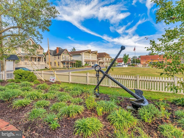 206 Village Center Blvd, Milton, DE 19968 - view of yard with a residential view and fence