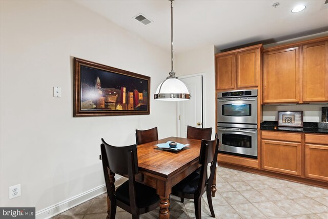 6000 Same Voyage Way Unit 307, Clarksville, MD 21029 - dining area featuring light tile patterned floors and baseboards