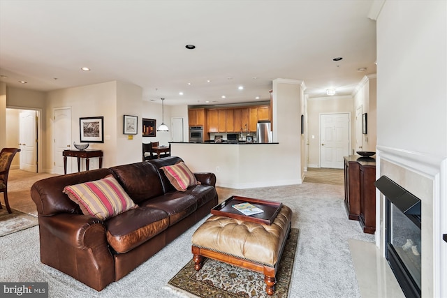 6000 Same Voyage Way Unit 307, Clarksville, MD 21029 - living room with light carpet, recessed lighting, baseboards, a fireplace with flush hearth, and crown molding