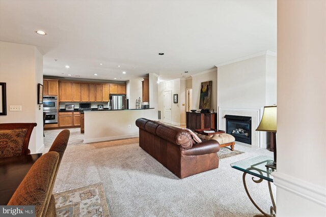 6000 Same Voyage Way Unit 307, Clarksville, MD 21029 - living room featuring recessed lighting, light colored carpet, a glass covered fireplace, and crown molding