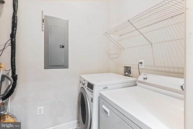 6000 Same Voyage Way Unit 307, Clarksville, MD 21029 - clothes washing area featuring electric panel, washer and dryer, and baseboards