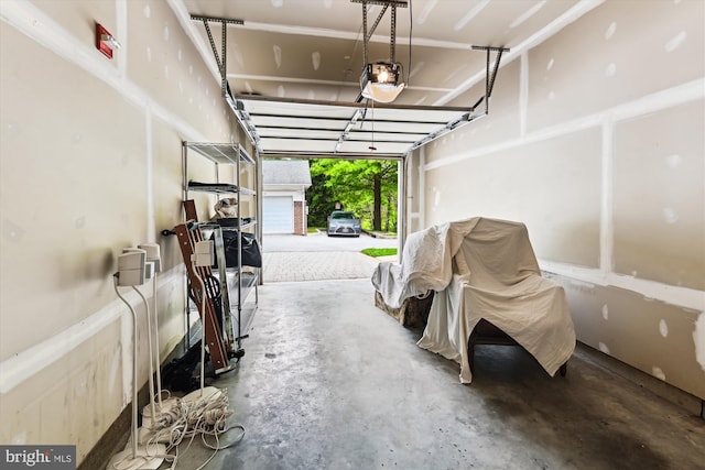 6000 Same Voyage Way Unit 307, Clarksville, MD 21029 - garage featuring a garage door opener