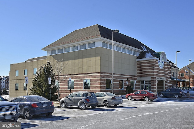 6000 Same Voyage Way Unit 307, Clarksville, MD 21029 - view of building exterior with uncovered parking