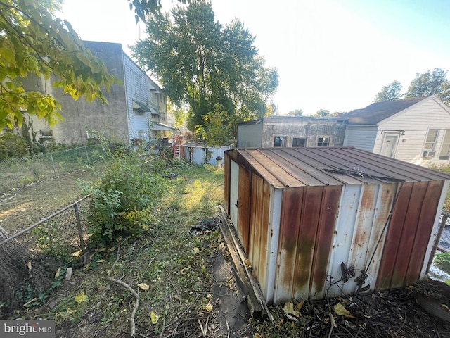 view of shed featuring a fenced backyard