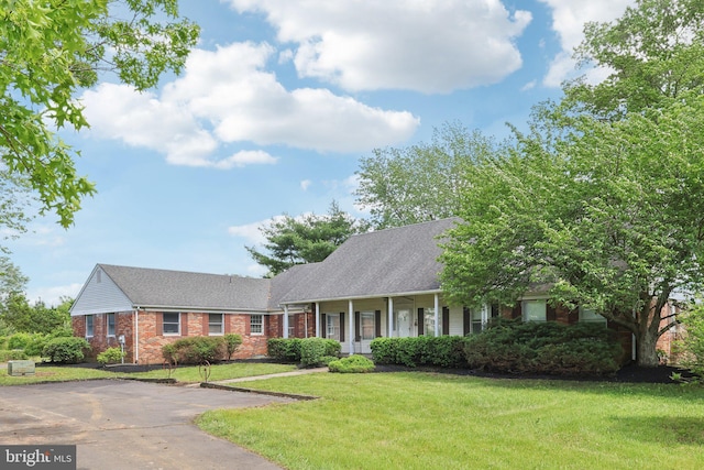 237 Bordentown-Georgetown Rd, Chesterfield, NJ 08515 - view of front facade with a front lawn, brick siding, roof with shingles, and a porch