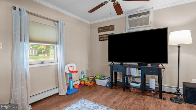 10 Queen Lily Rd, Levittown, PA 19057 - recreation room with a wall mounted air conditioner, a ceiling fan, wood finished floors, ornamental molding, and a baseboard heating unit