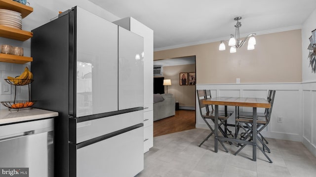 10 Queen Lily Rd, Levittown, PA 19057 - dining area with a chandelier and crown molding
