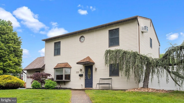 10 Queen Lily Rd, Levittown, PA 19057 - view of front of house with a front yard