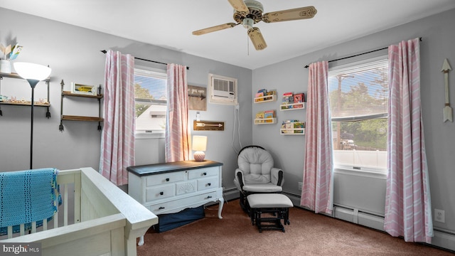 10 Queen Lily Rd, Levittown, PA 19057 - bedroom with carpet flooring, a wall mounted air conditioner, a ceiling fan, and baseboard heating