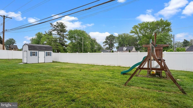 10 Queen Lily Rd, Levittown, PA 19057 - view of yard with a playground, a storage unit, and an outbuilding