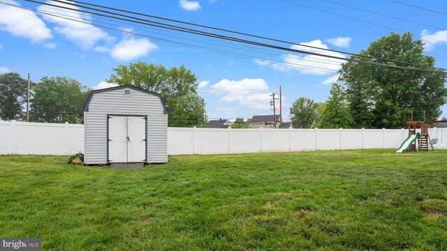 10 Queen Lily Rd, Levittown, PA 19057 - view of yard with a storage shed, a playground, and an outdoor structure