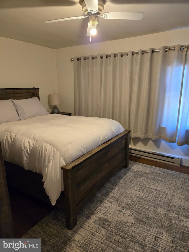 3880 Laurel Grove Rd, Federalsburg, MD 21632 - bedroom with a baseboard heating unit and ceiling fan