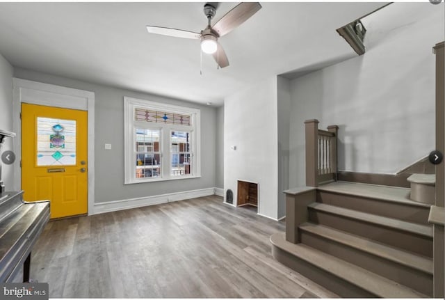 5410 Webster St, Philadelphia, PA 19143 - entryway featuring stairway, wood finished floors, baseboards, and ceiling fan