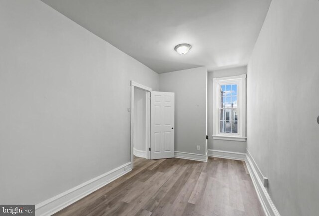 5410 Webster St, Philadelphia, PA 19143 - empty room with baseboards and wood finished floors
