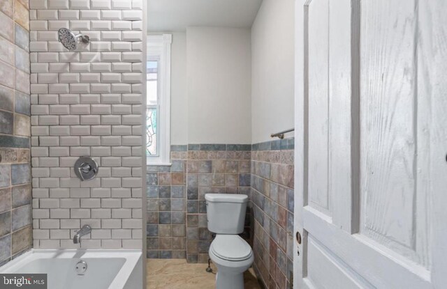 5410 Webster St, Philadelphia, PA 19143 - bathroom with shower / bath combination, wainscoting, toilet, and tile walls