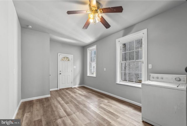 5410 Webster St, Philadelphia, PA 19143 - interior space featuring baseboards, light wood finished floors, washer / clothes dryer, and ceiling fan